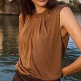 Sleeveless top w/pleated neck