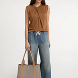 Sleeveless top w/pleated neck